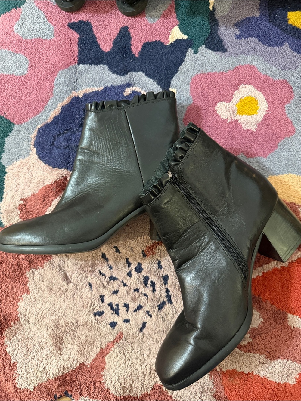 Black Leather Ankle Booties with Ruffle Collar